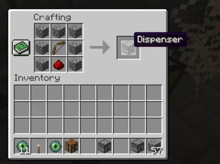 How do you craft a dispenser in minecraft